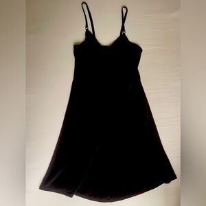 New, never worn Calvin Klein black short dress. Size 10